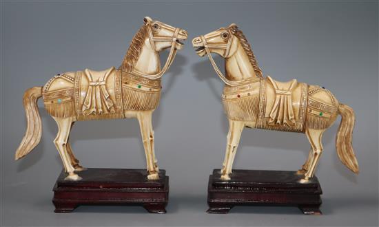 Two 19th century ChInese ivory horses with inset gem stones, on stands